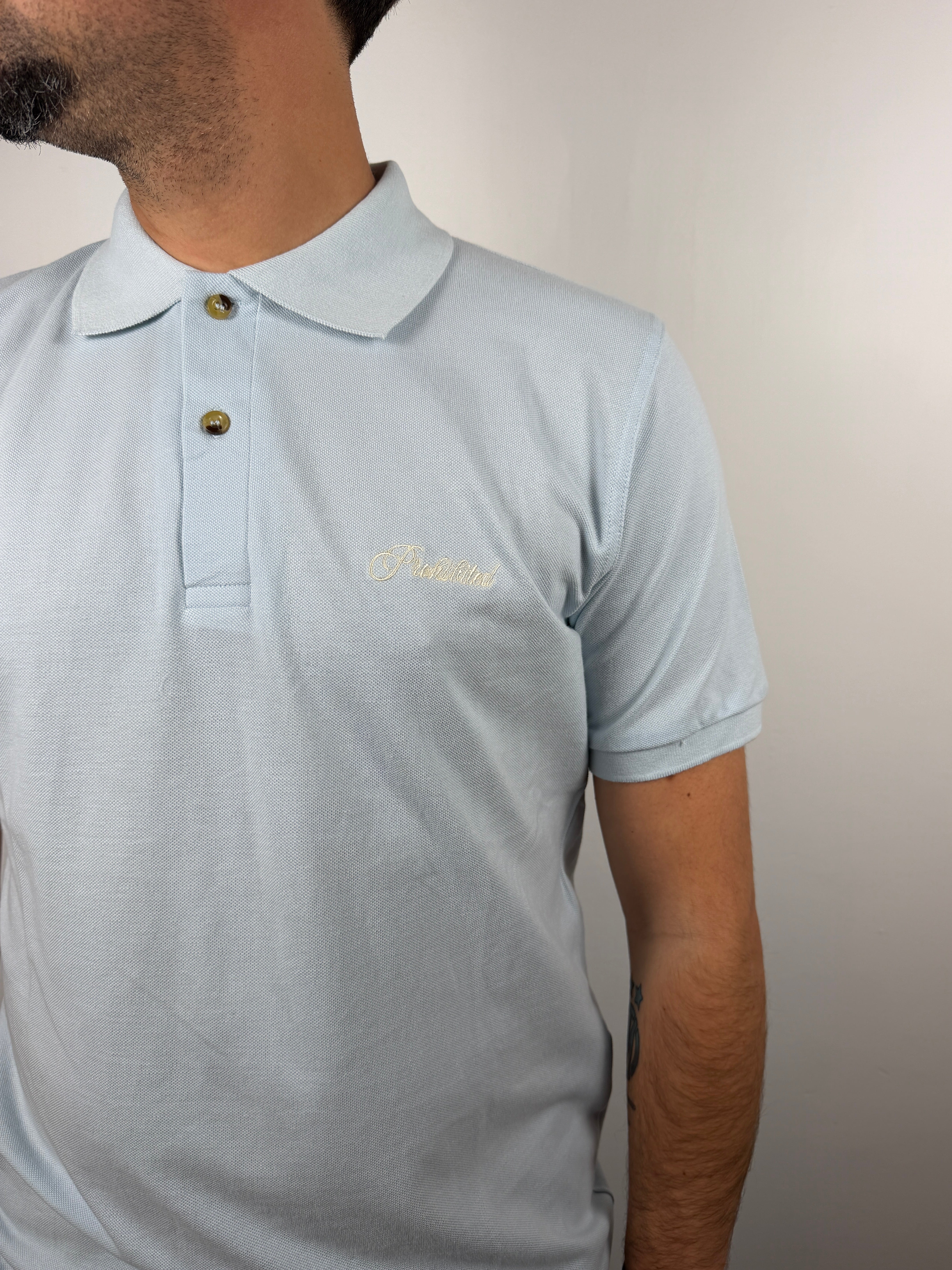 HAMPTON POLO CELESTE PROHIBITED